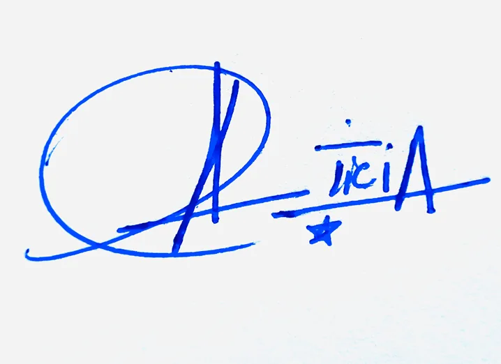 Alicia handwritten signature example in blue ink on white background